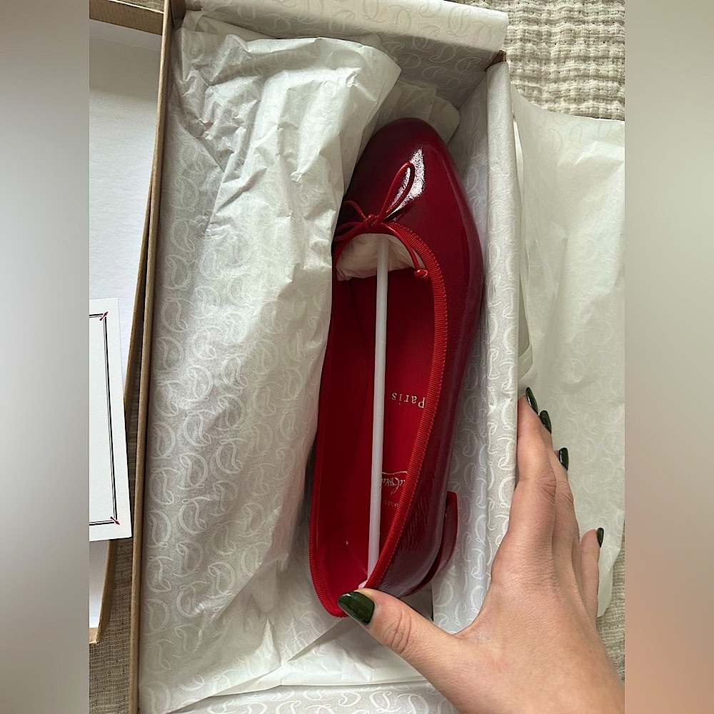 BRAND NEW Christian Louboutin Flats - Sweetie Jane. SIZE 38. In Red